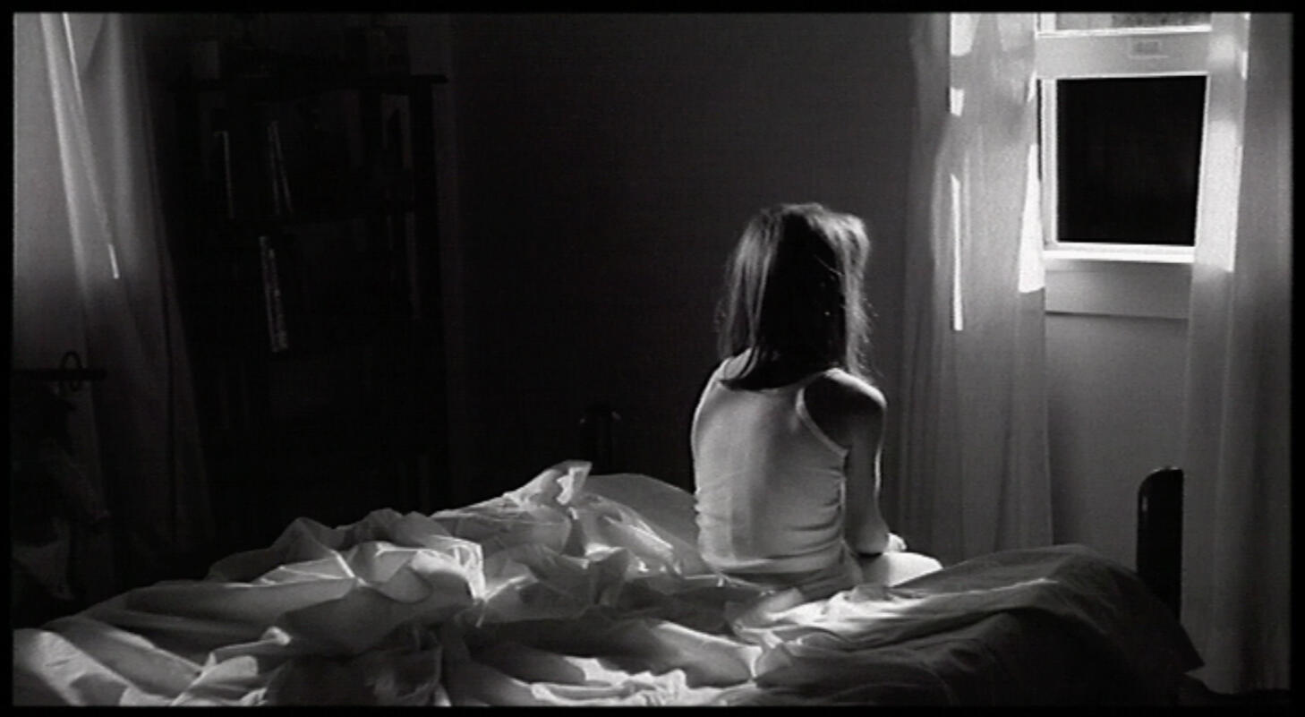 Girl looking out window at night image by Scott L. Dale Black & White handcrank silent film frame of a girl looking out window at night image by Scott L. Dale